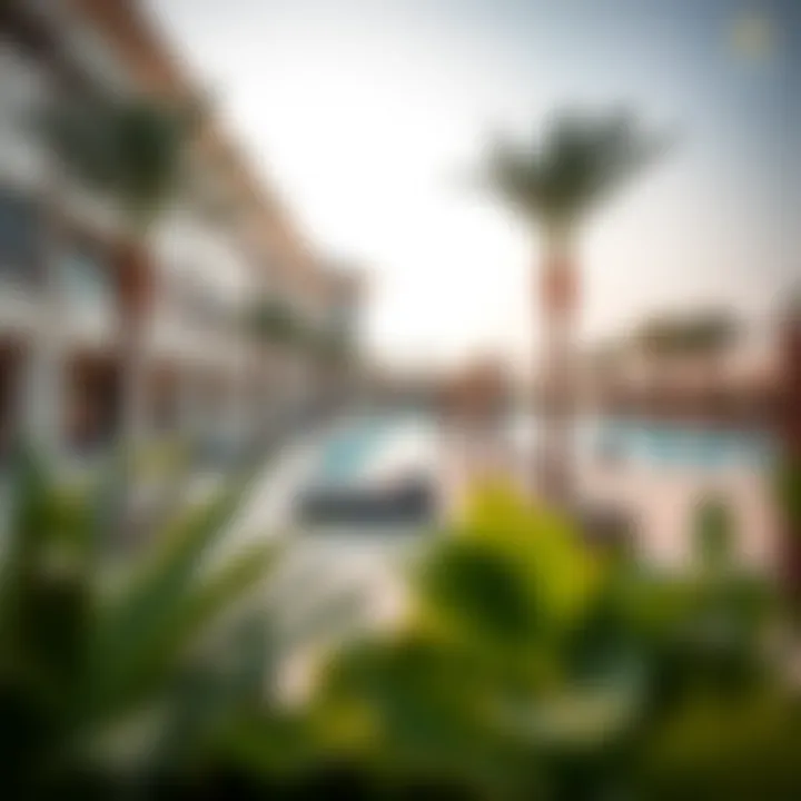 A panoramic view of the lush amenities available within Balqis Residence, including pools and recreational areas.