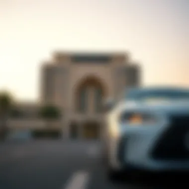Car in Front of UAE Landmark A car parked in front of a UAE landmark with a clear sky