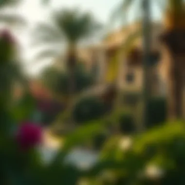 Exploring Luxurious Neighborhoods in Dubai A vibrant neighborhood in Dubai with lush greenery and luxury villas.
