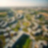 Aerial view of Jumeirah Village Circle showcasing the layout and greenery